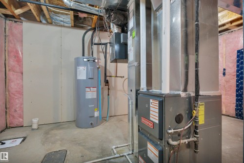 1558 Plum Circle Sw, Edmonton, AB - Indoor Photo Showing Basement