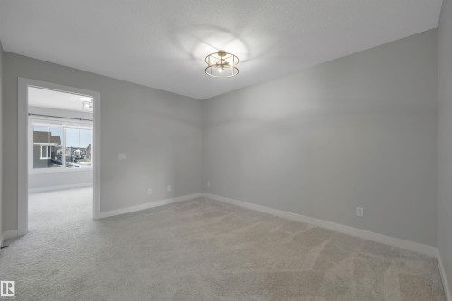 1558 Plum Circle Sw, Edmonton, AB - Indoor Photo Showing Other Room