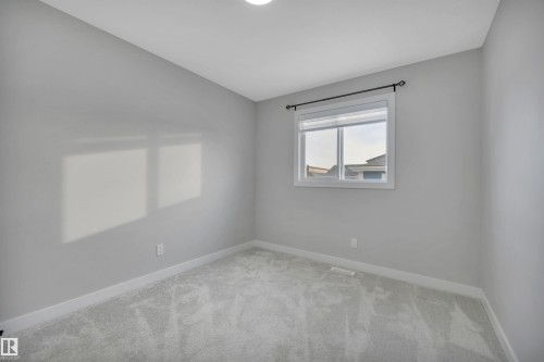 1558 Plum Circle Sw, Edmonton, AB - Indoor Photo Showing Other Room