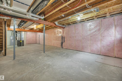 1558 Plum Circle Sw, Edmonton, AB - Indoor Photo Showing Basement