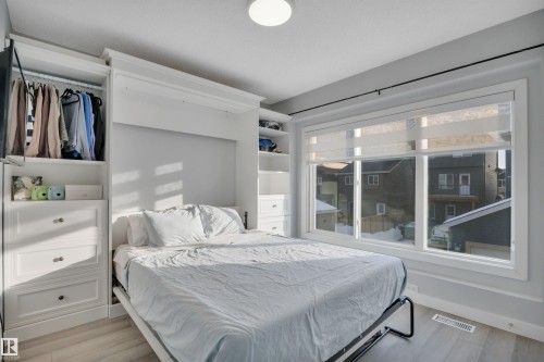 1558 Plum Circle Sw, Edmonton, AB - Indoor Photo Showing Bedroom