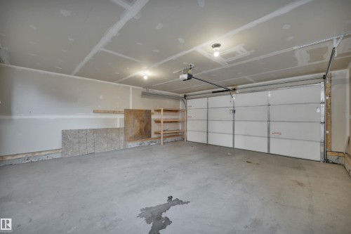 1558 Plum Circle Sw, Edmonton, AB - Indoor Photo Showing Garage