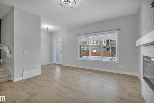 1558 Plum Circle Sw, Edmonton, AB - Indoor With Fireplace