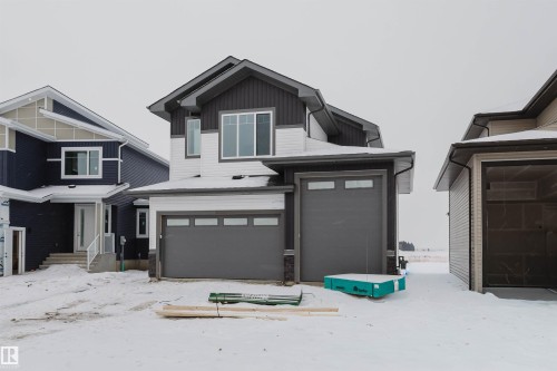 204 Basin Court, Leduc, AB - Outdoor With Facade