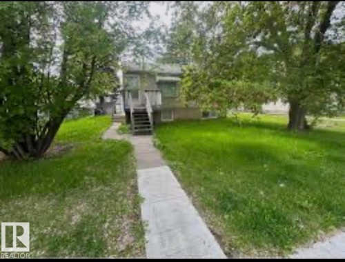 Exterior space with a front yard - 10006 152 Street Nw, Edmonton, AB - Outdoor