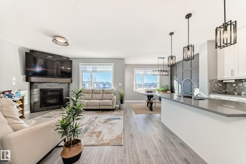 154 Aston Bend, Leduc, AB - Indoor Photo Showing Living Room With Fireplace