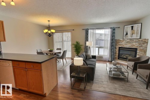 16127 132 Street, Edmonton, AB - Indoor Photo Showing Living Room With Fireplace