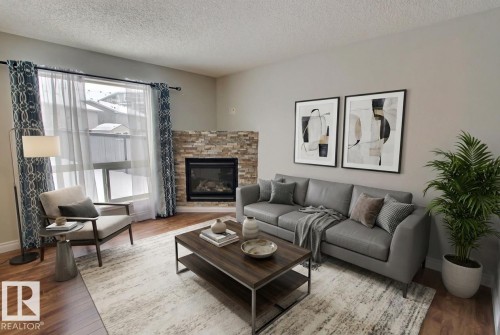 16127 132 Street, Edmonton, AB - Indoor Photo Showing Living Room With Fireplace