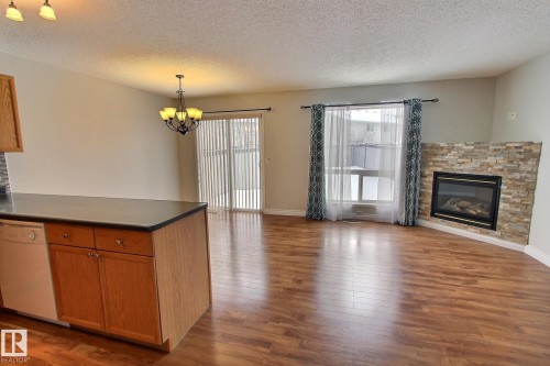 16127 132 Street, Edmonton, AB - Indoor Photo Showing Living Room With Fireplace