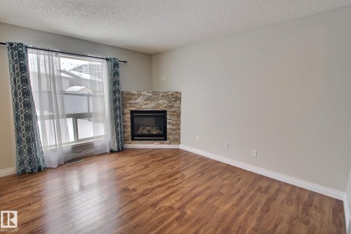 16127 132 Street, Edmonton, AB - Indoor Photo Showing Living Room With Fireplace