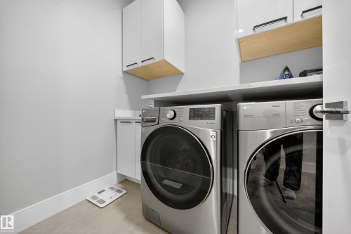 4406 Triomphe Close, Beaumont, AB - Indoor Photo Showing Laundry Room
