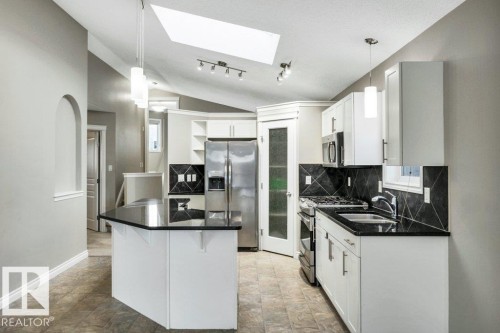 708 60 Street, Edmonton, AB - Indoor Photo Showing Kitchen With Double Sink