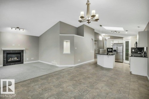 708 60 Street, Edmonton, AB - Indoor Photo Showing Kitchen With Fireplace
