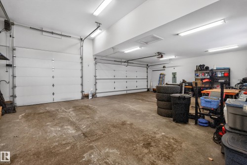 Garage with electric panel - 9415 144 Street, Edmonton, AB - Indoor Photo Showing Garage