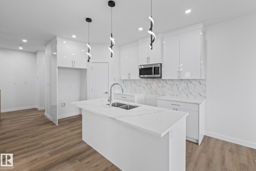 68 Waverly Way, Fort Saskatchewan, AB - Indoor Photo Showing Kitchen With Double Sink With Upgraded Kitchen