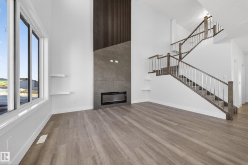 464 Crystal Creek Link, Leduc, AB - Indoor With Fireplace