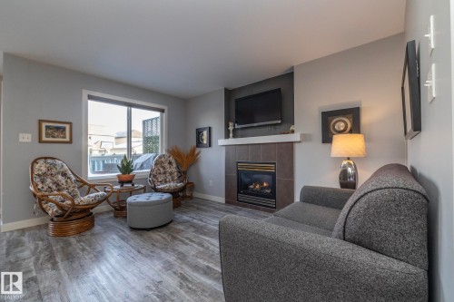 1615 Rutherford Road, Edmonton, AB - Indoor Photo Showing Living Room With Fireplace