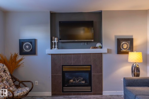 1615 Rutherford Road, Edmonton, AB - Indoor Photo Showing Living Room With Fireplace