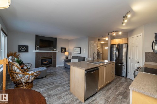 1615 Rutherford Road, Edmonton, AB - Indoor Photo Showing Kitchen With Fireplace With Double Sink
