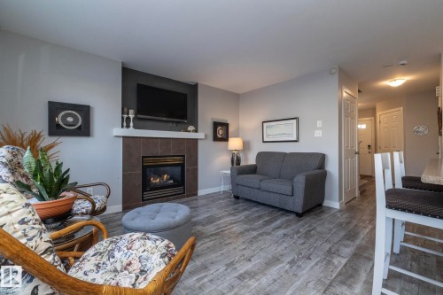 1615 Rutherford Road, Edmonton, AB - Indoor Photo Showing Living Room With Fireplace