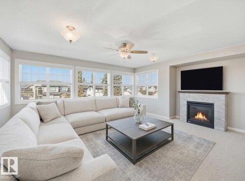 2311 Bailey Court, Edmonton, AB - Indoor Photo Showing Living Room With Fireplace