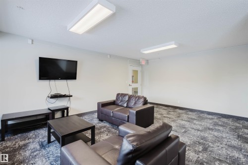 108 396 Silver Berry Road, Edmonton, AB - Indoor Photo Showing Living Room