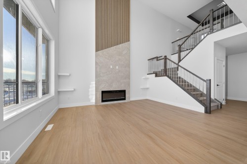 461 Crystal Creek Link, Leduc, AB - Indoor With Fireplace