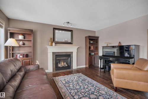 581 Foxboro Loop, Sherwood Park, AB - Indoor Photo Showing Living Room With Fireplace
