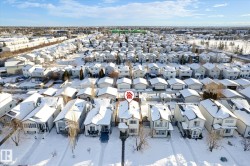 Snowy aerial view with a residential view - 