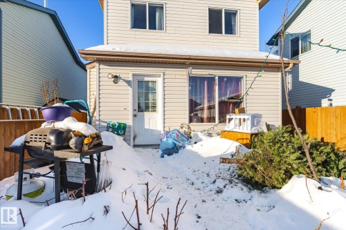 View of snow covered back of property - 15035 133 Street, Edmonton, AB - Outdoor With Exterior