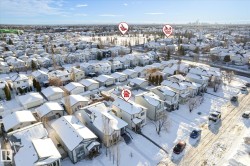 Snowy aerial view with a residential view - 