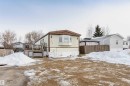 Snow covered rear of property with a deck - 216 53222 Rge Rd 272, Rural Parkland County, AB  - Outdoor 