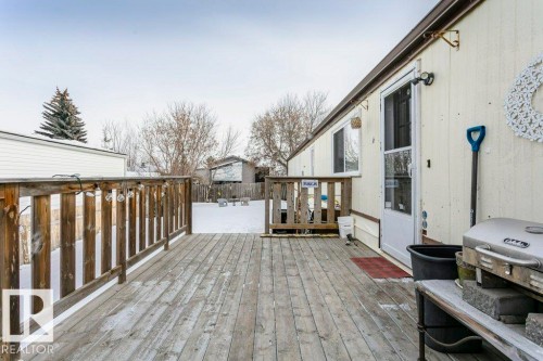 Wooden terrace with grilling area - 216 53222 Rge Rd 272, Rural Parkland County, AB - Outdoor With Deck Patio Veranda