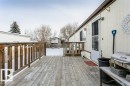 Wooden terrace with grilling area - 216 53222 Rge Rd 272, Rural Parkland County, AB  - Outdoor With Deck Patio Veranda 