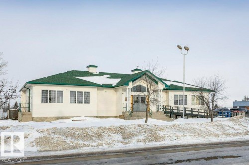 View of front of property featuring a chimney - 216 53222 Rge Rd 272, Rural Parkland County, AB - Outdoor