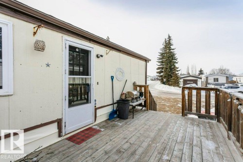 View of snow covered deck - 216 53222 Rge Rd 272, Rural Parkland County, AB - Outdoor With Deck Patio Veranda With Exterior