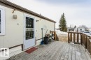 View of snow covered deck - 216 53222 Rge Rd 272, Rural Parkland County, AB  - Outdoor With Deck Patio Veranda With Exterior 