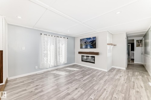 404 Evergreen Park, Edmonton, AB - Indoor Photo Showing Living Room With Fireplace
