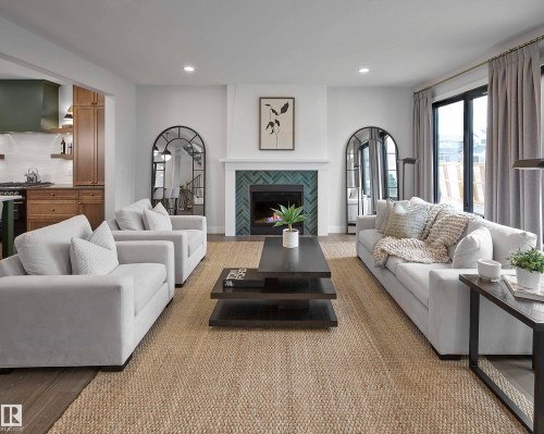 4640 Chegwin Wynd Sw, Edmonton, AB - Indoor Photo Showing Living Room With Fireplace