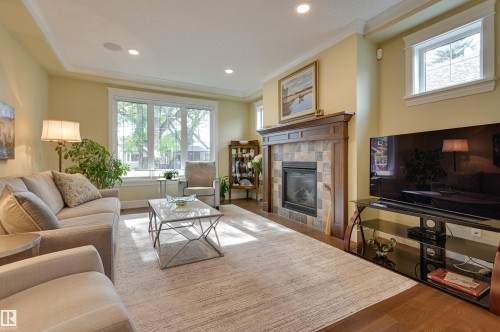 10810 74 Avenue, Edmonton, AB - Indoor Photo Showing Living Room With Fireplace