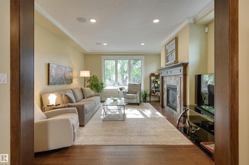 10810 74 Avenue, Edmonton, AB - Indoor Photo Showing Living Room With Fireplace