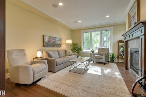 10810 74 Avenue, Edmonton, AB - Indoor Photo Showing Living Room With Fireplace
