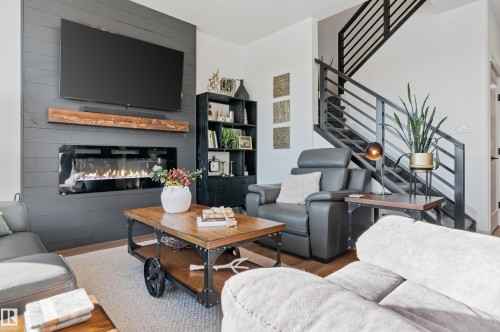 57 Savoy Crescent, Sherwood Park, AB - Indoor Photo Showing Living Room With Fireplace