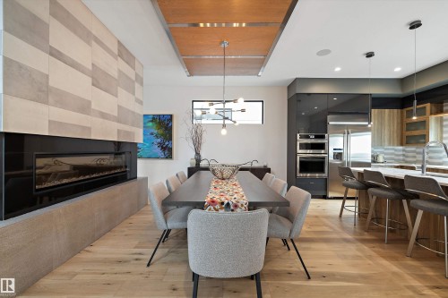 44A Valleyview Crescent, Edmonton, AB - Indoor Photo Showing Dining Room With Fireplace