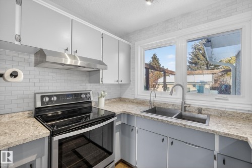 11508 35A Avenue, Edmonton, AB - Indoor Photo Showing Kitchen With Double Sink