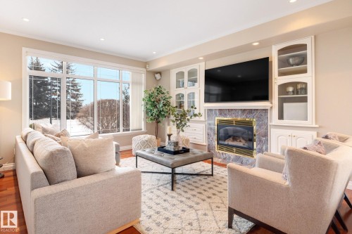 9704 Riverside Drive, Edmonton, AB - Indoor Photo Showing Living Room With Fireplace