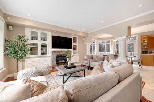 9704 Riverside Drive, Edmonton, AB - Indoor Photo Showing Living Room With Fireplace