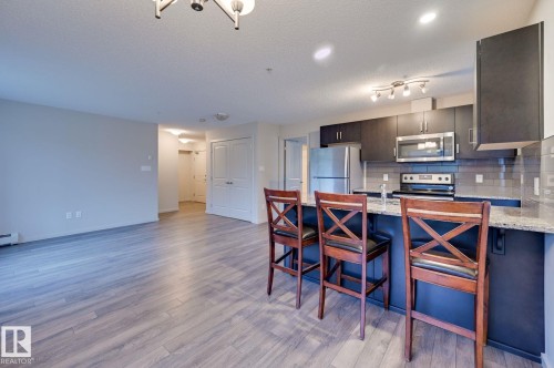 101 142 Ebbers Boulevard, Edmonton, AB - Indoor Photo Showing Kitchen With Stainless Steel Kitchen