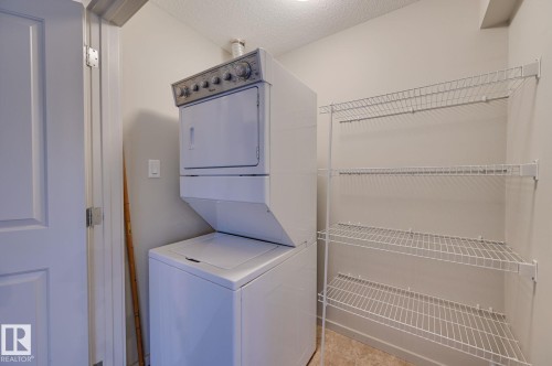 101 142 Ebbers Boulevard, Edmonton, AB - Indoor Photo Showing Laundry Room