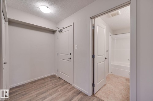 101 142 Ebbers Boulevard, Edmonton, AB - Indoor Photo Showing Other Room
